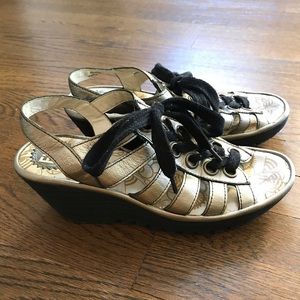 Fly London bronze sandals black shoe laces shoes